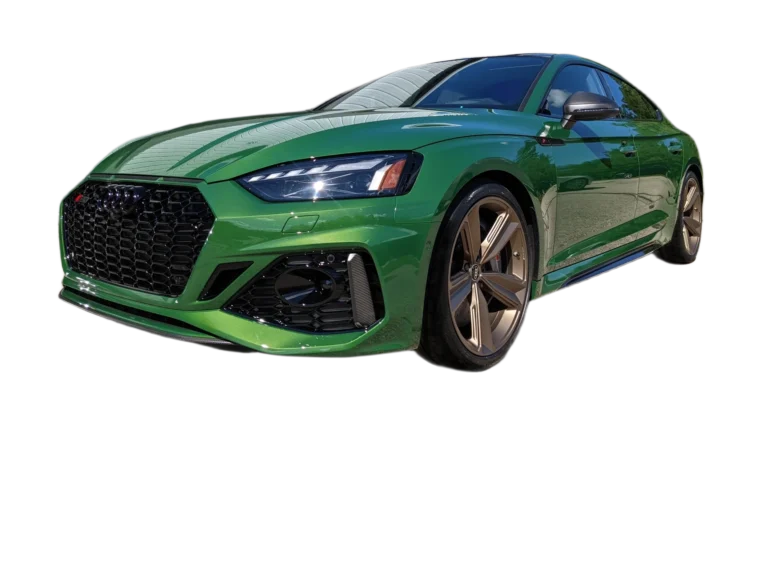 Green sports sedan with black grille and bronze wheels, representing Reflex Tuning, Hooksett NH European auto repair.