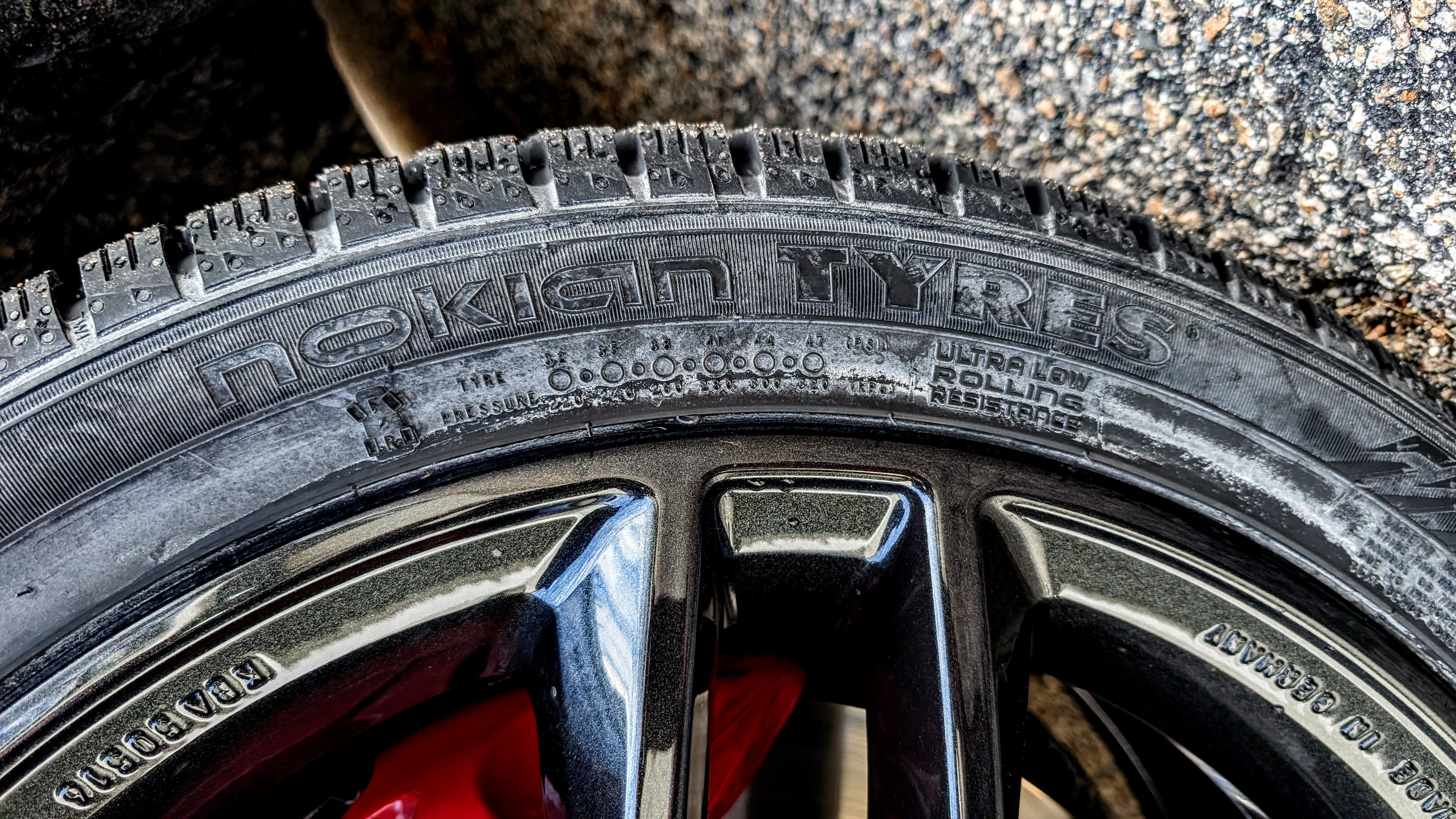 Nokian Tyres sidewall showing Ultra Low Rolling Resistance marking on black alloy wheel