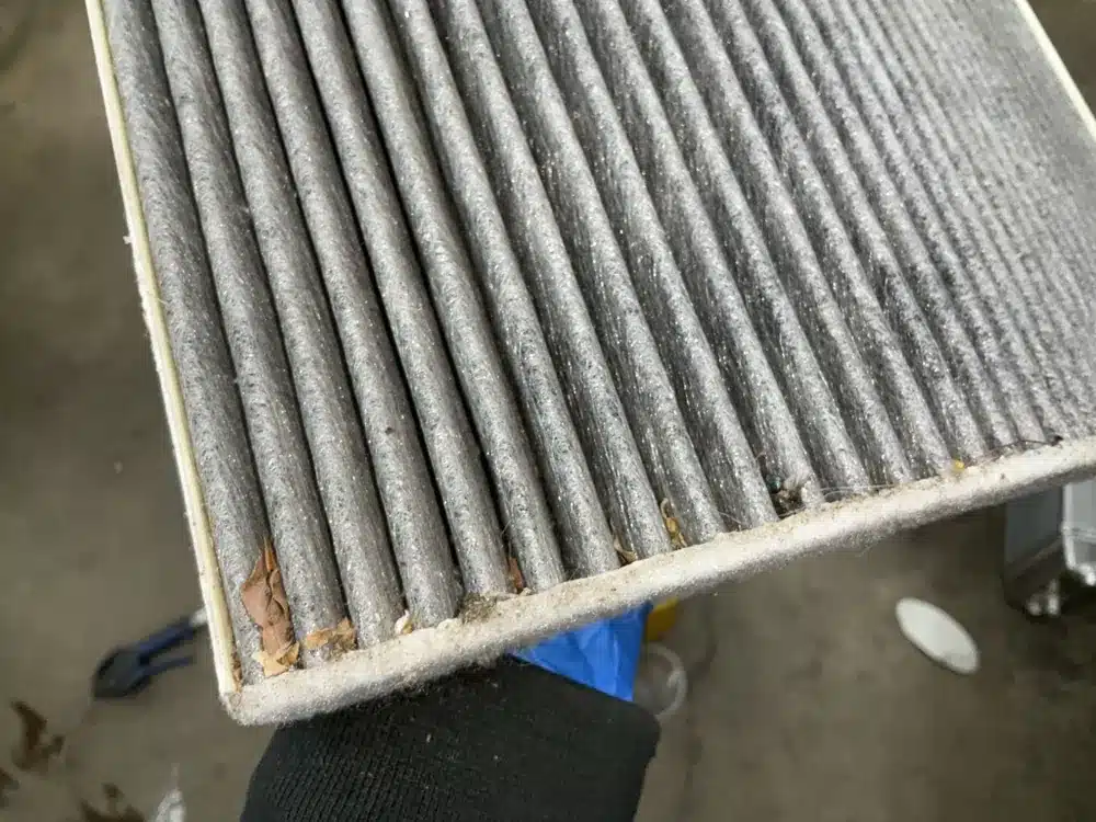 Dirty cabin air filter removed from a 2021 Audi Q5 with only 10,000 miles on it