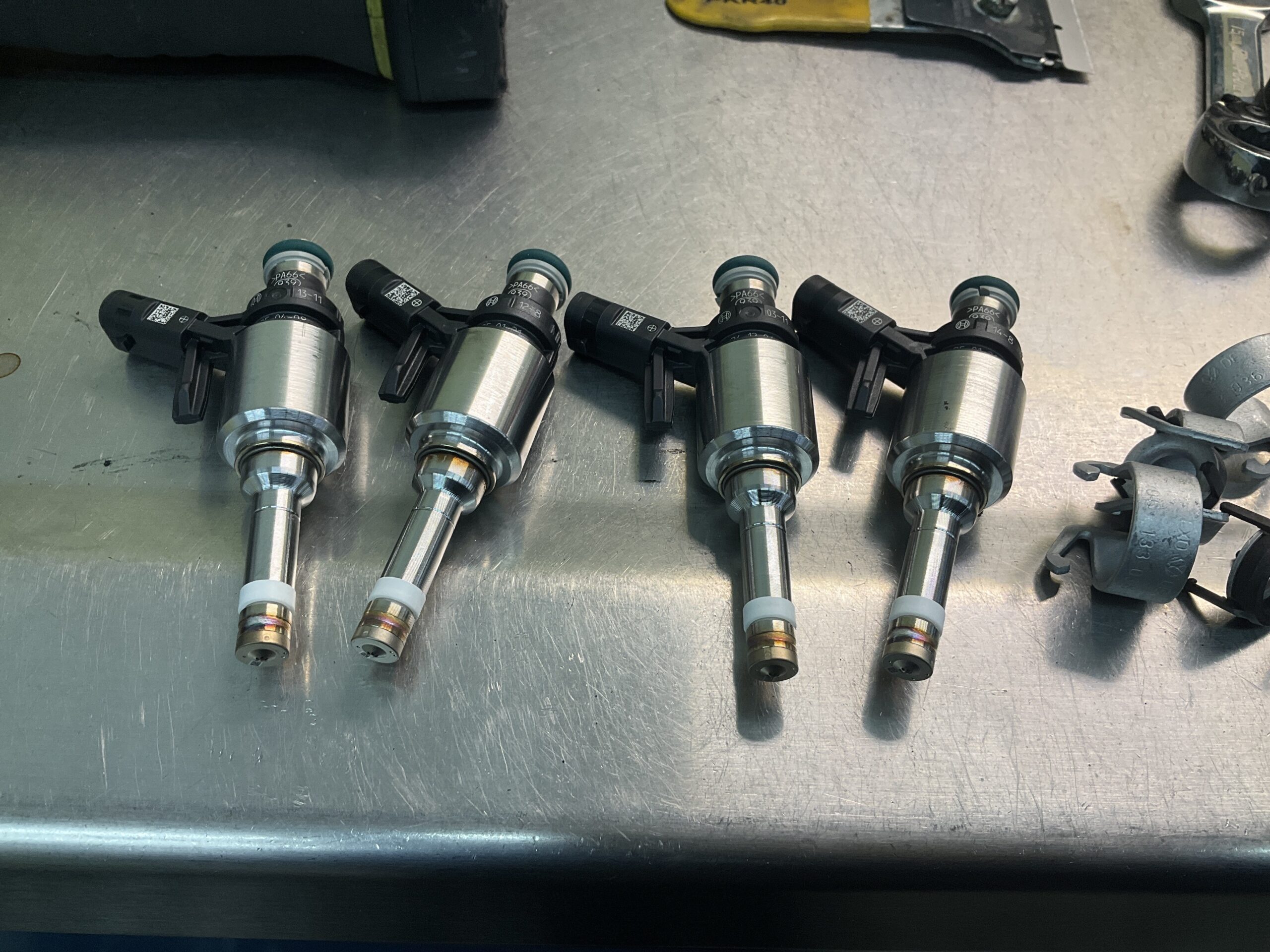 New OEM fuel injectors for a 2018 Audi S3 EA888 engine at Reflex Automotive Hooksett NH